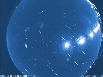 This false-color composite image shows meteors streaking through the skies over NASA's Marshall Space Flight Center in Huntsville, Ala., on the night of Jan. 3-4, 2012.