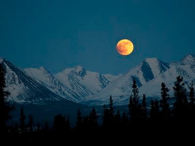 A full moon rises in Denali National Park and Preserve in Alaska.&nbsp;The full moon this week is the closest one of the year.