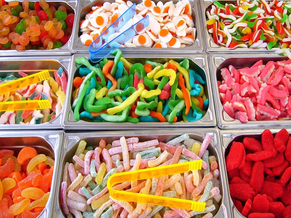 Colorful candies in bins at a candy store