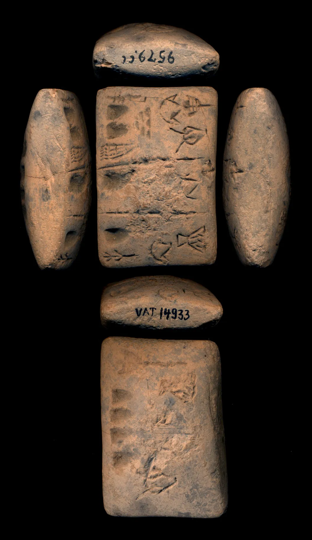 Tablets with engravings against a black background