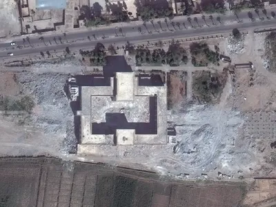 Shrine to Uwais al-Qurani and Ammar Bin Yasser. After: October 6, 2014.

All three tombs on the outside of the shrine, their minarets and a section of the linking arcaded pricinct have been destroyed.  